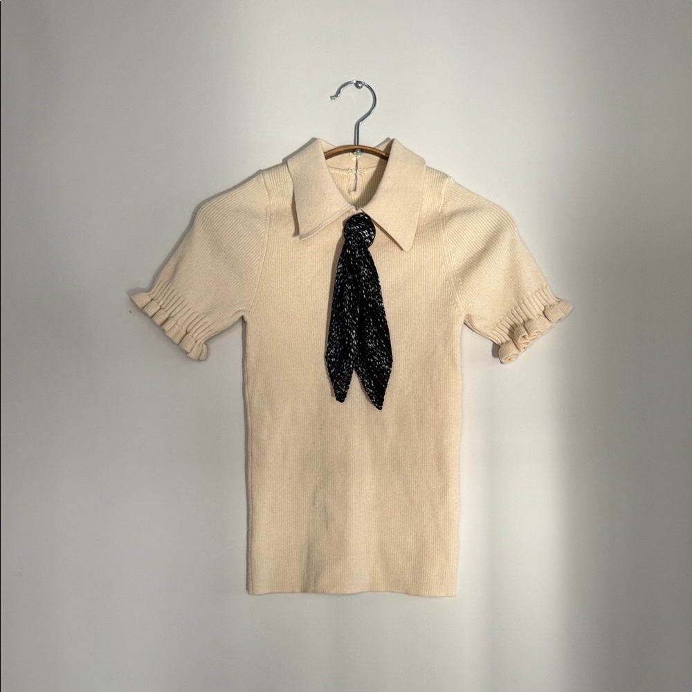 Elegant Cream Knit Top with Black Tie Detail